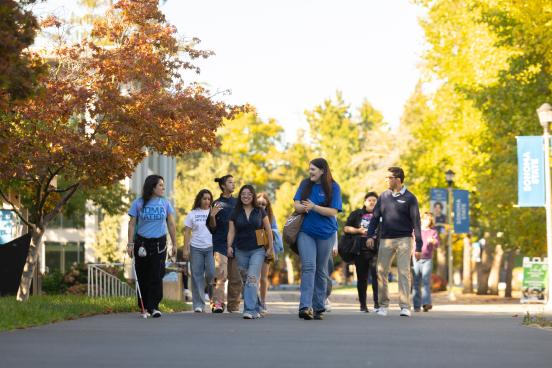 Students walking to Seawolf Plaza in a group