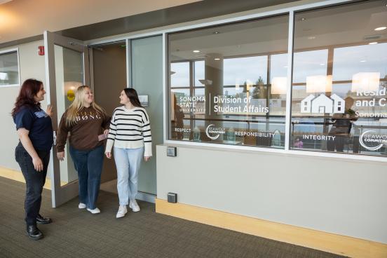 Students walking out of REACH office