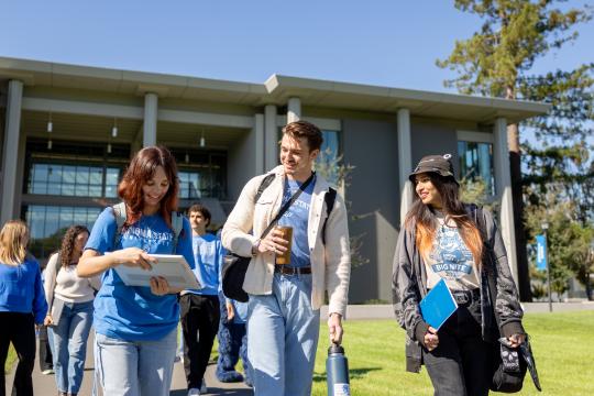 Group of students walking along the Stevenson quad