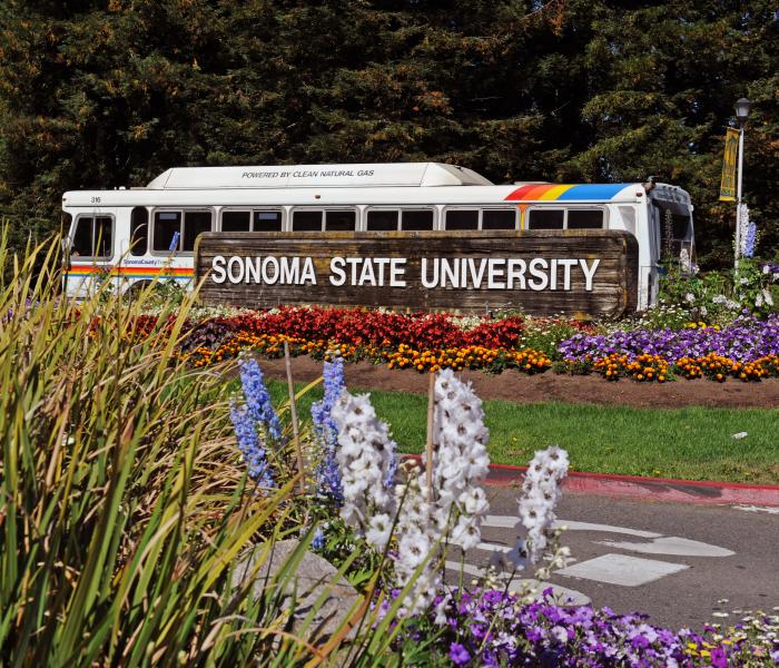 Photo of Entrance Sign with Bus