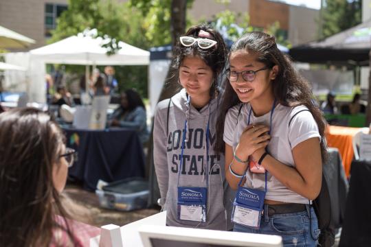 This photo shows two incoming students at orientation.